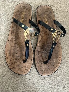 Michael Kors Black Patent T-Strap Sandals with Gold MK Logo